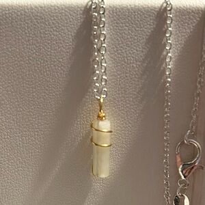 Elegant Gold and Silver Pendant Necklace